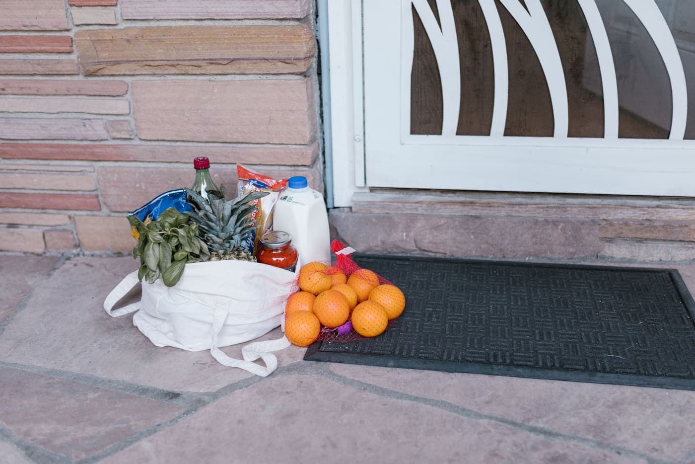 A bag of groceries left at a front door